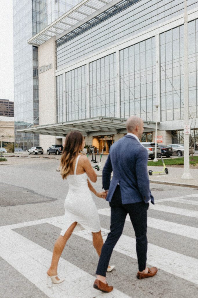 couple walking on the street for engagement photos