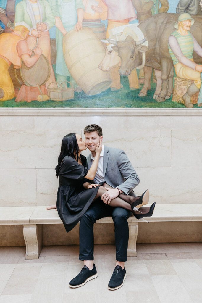 girl crossing legs over guy engagement photos locations