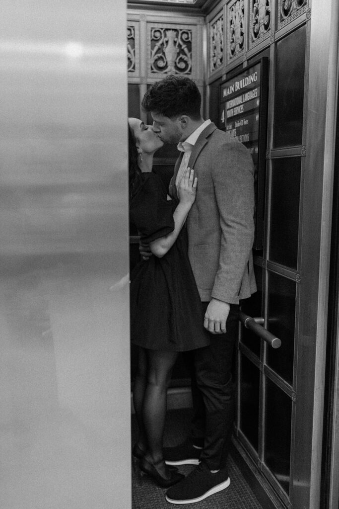 couple kissing behind closing elevator door