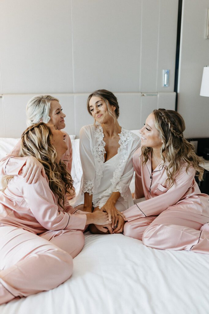 bridesmaids getting ready for ohio wedding on downtown cleveland oh