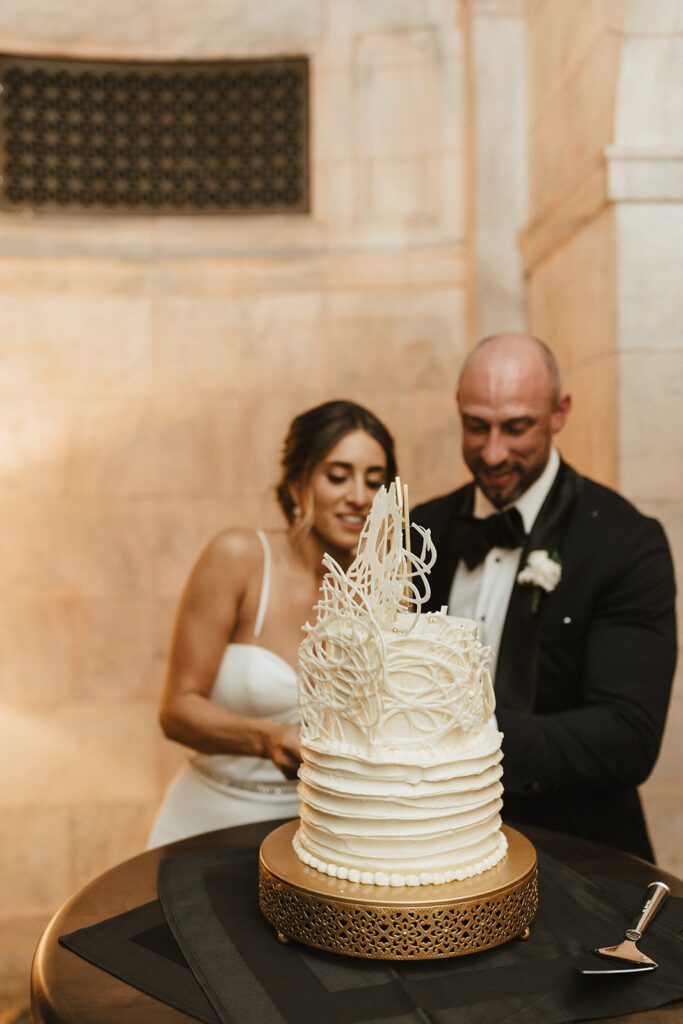 bride and groom cutting cake downtown cleveland oh