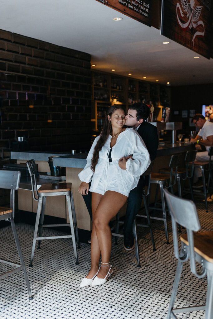 engagement photos in a bar