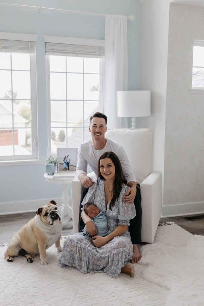 in home lifestyle newborn session photos with husband and wife